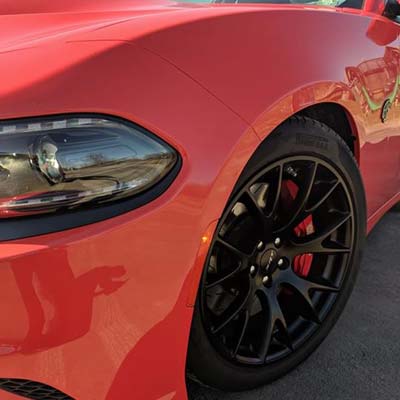 clean wheels on red muscle car